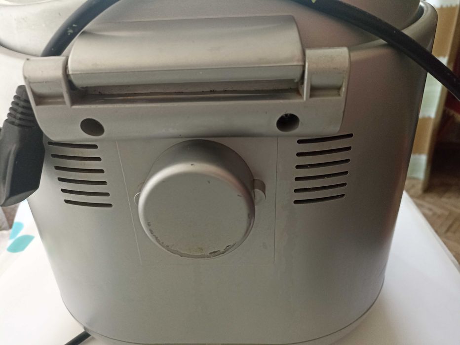 Хлебопечка Delonghi