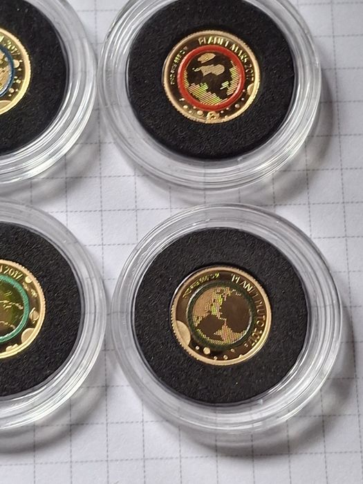 10 золотих монет 999 проби