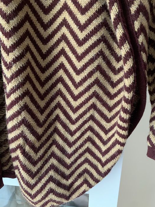 Casaco malha . Marca Sigilo