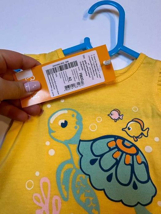 Koszulka T-shirt 62 krótki rękaw z falbanką żółta zapinana z tyłu