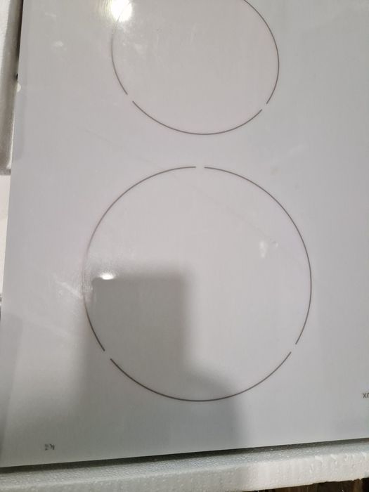 Індукційна плита з тріснутим склом