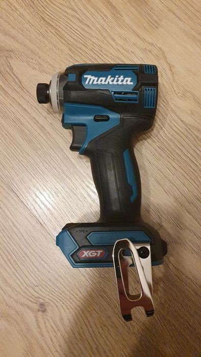 Makita zakrętarka udarowa 1/4" 40V TD001G aku, ładowarka. Nieużywana