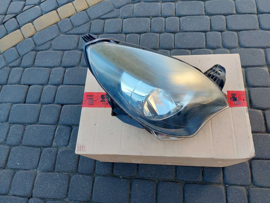 Lampa Przednia PRAWA RENAULT TWINGO II LIFT 2012- Europa Oryginał
