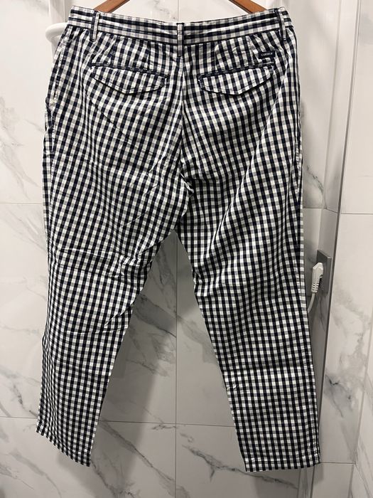 Чоловічі штани в клітинку