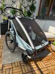 Thule Chariot Cross 2 - dziecięca przyczepka rowerowa (Cybex, Bugaboo)