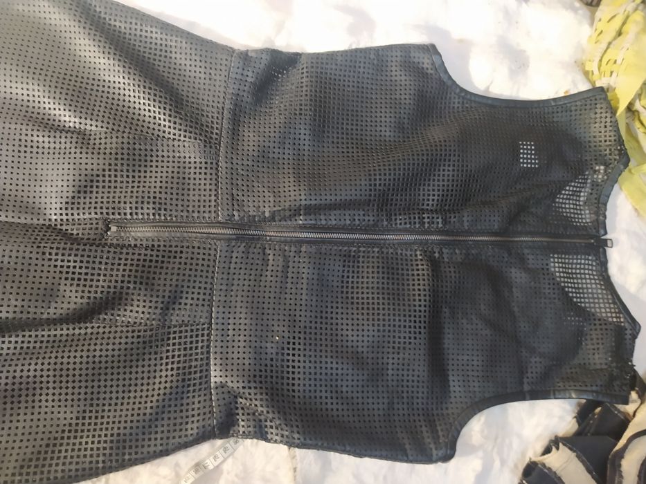 Sukienka skórzana.Calvin Klein