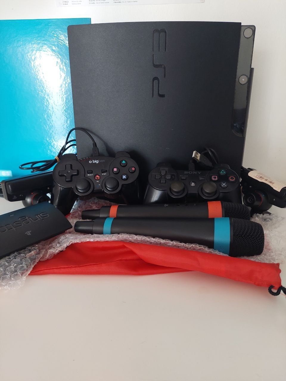 Vendo ps3 com comando e varios jogos