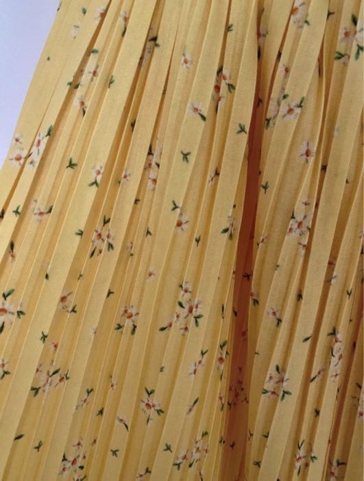 Calça plissada floral