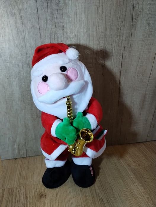 Grajacy mikolaj święta 
Wysokość: 35cm
Baterie 3xAA w własnym zakre