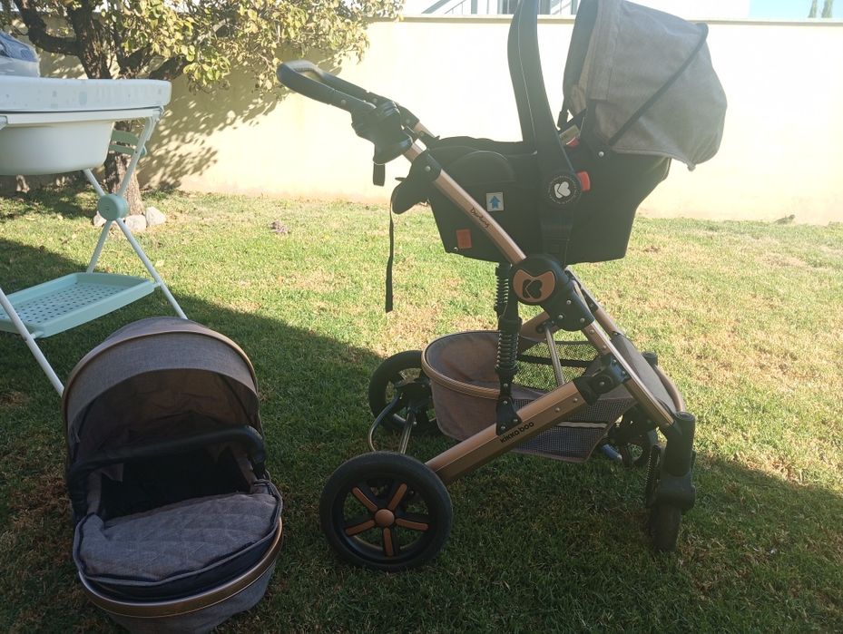 Kit carrinho bebe + trocador com banheira + porta bebe canguru