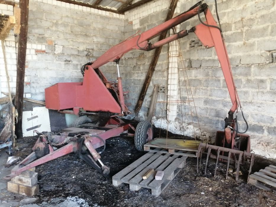 Ładowacz cyklop chwytakowy garażowany