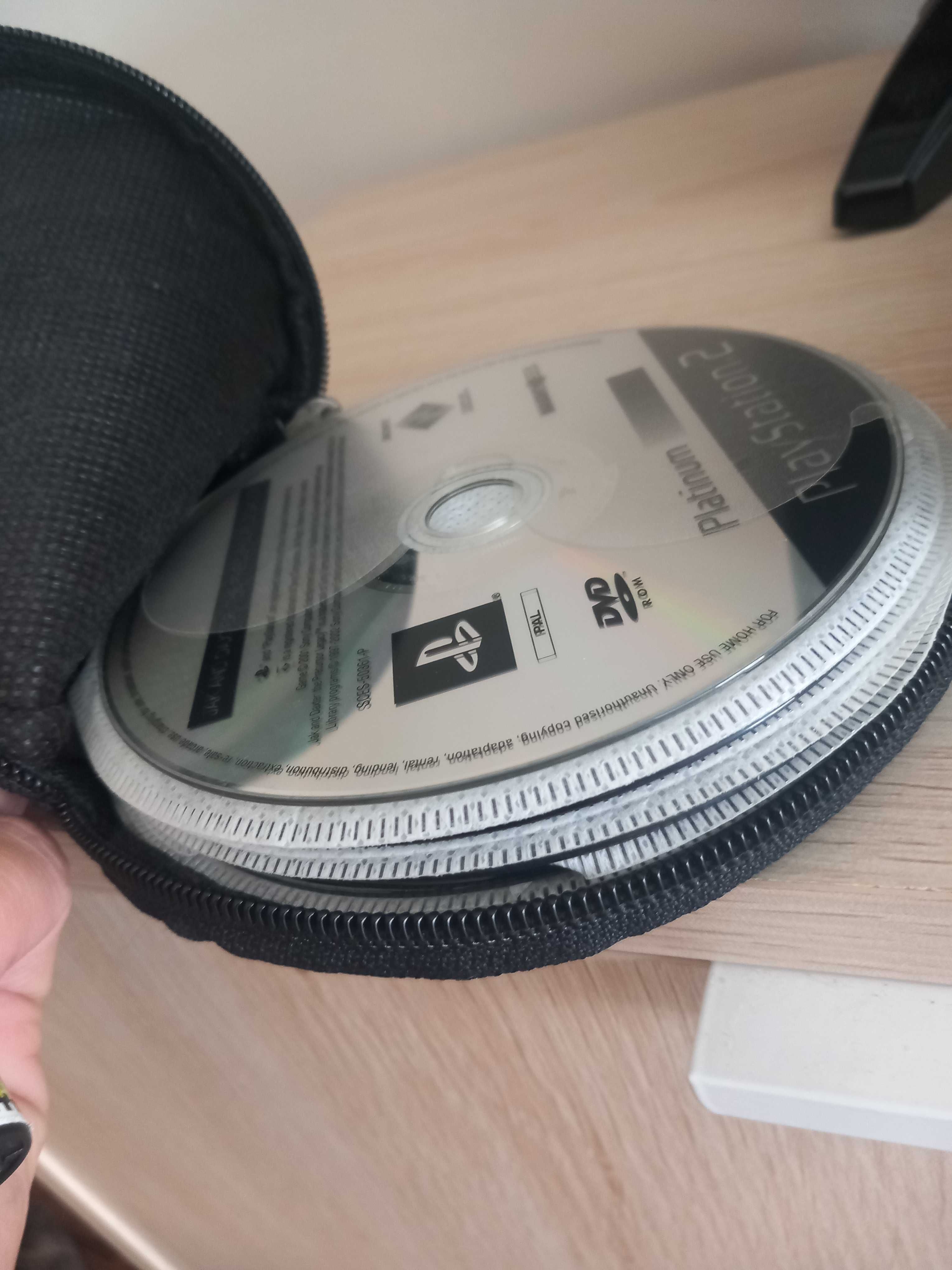 Playstation 2 (inclui 19 jogos e 1 comando)