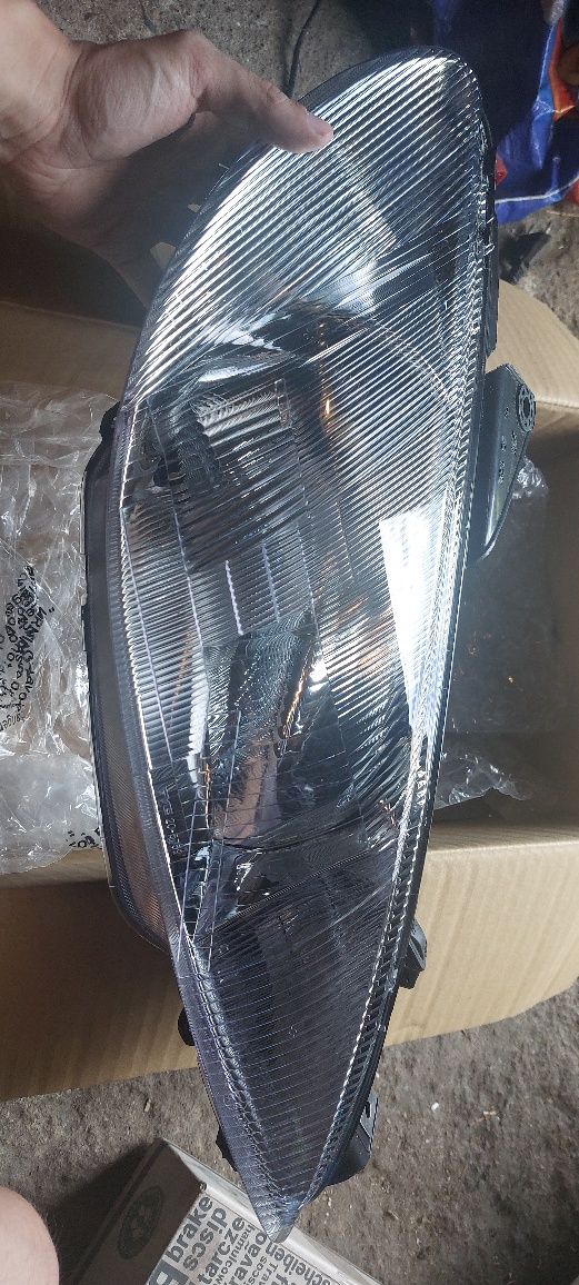 Komplet nowych lamp peugeot 206 polift
