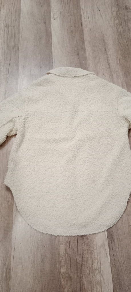 Bluza damska zapinana.