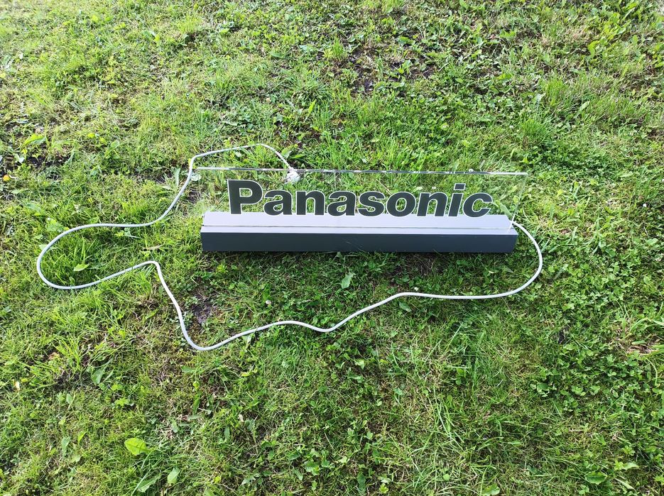 Oryginalny podświetlany szyld reklamowy Panasonic z plexi i podstawą