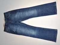 Chłopięce spodnie jeansowe marki MILLIONX 152 cm (S)