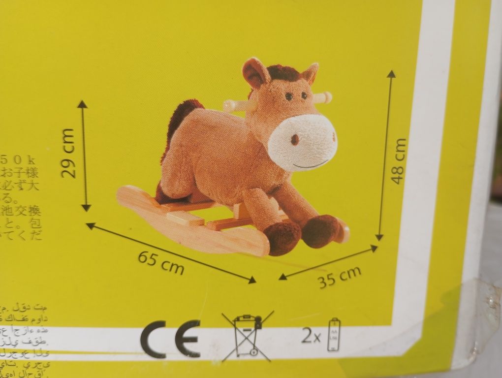 Cavalo de baloiço com música