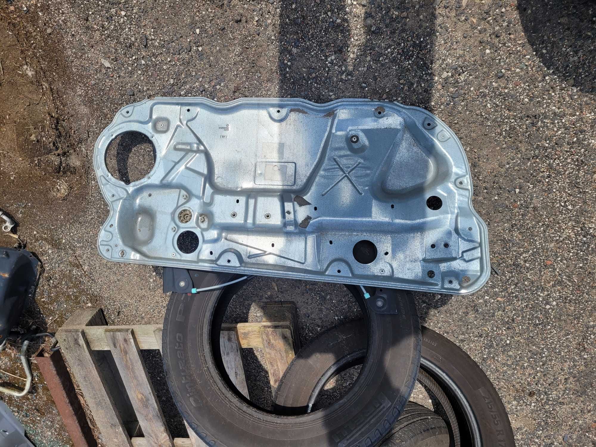 Podnośnik szyby lewej elektryczny VW Polo 6Q