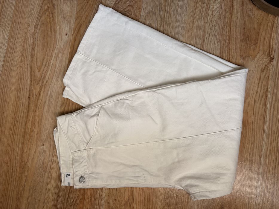 Białe spodnie jeansy sinsay wild led M 38