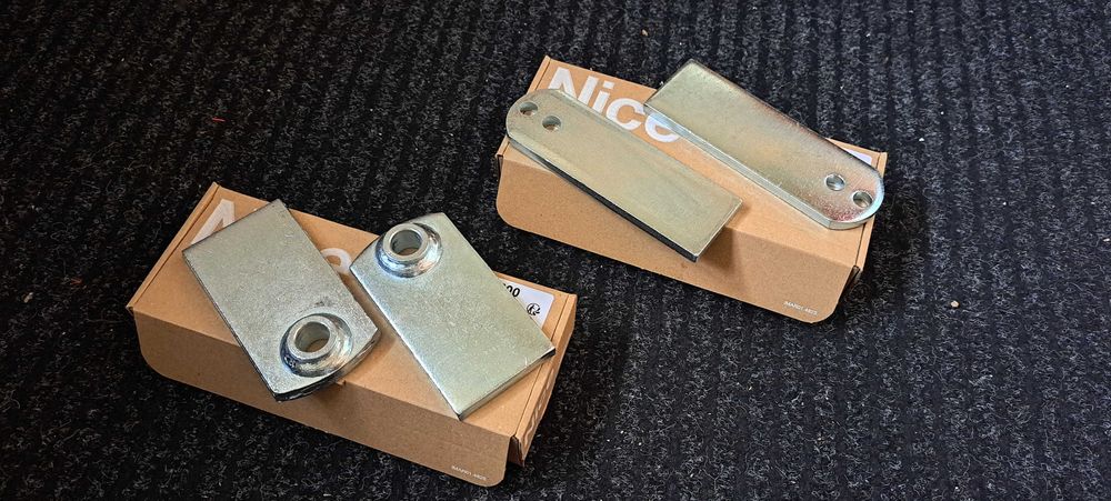 Uchwyty siłowników Nice Wingo