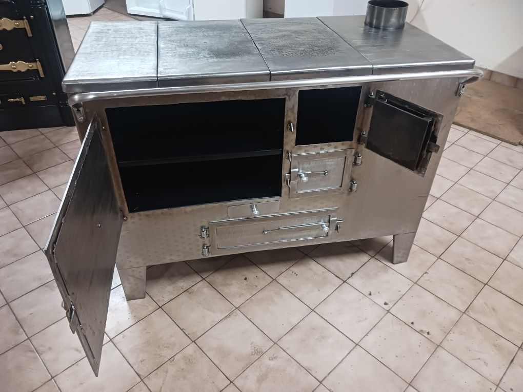 Vendo fogao em ferro inox com serpentina para aquecimento central em ó