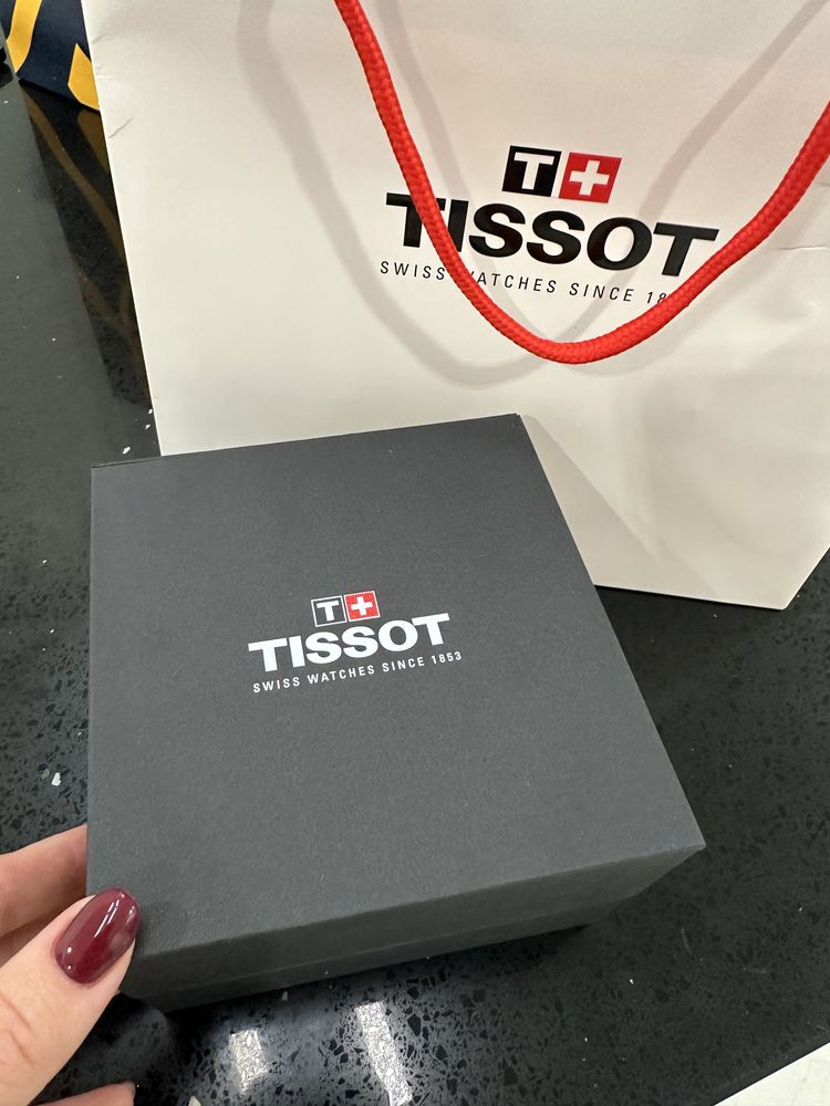 Tissot годинник швейцарський