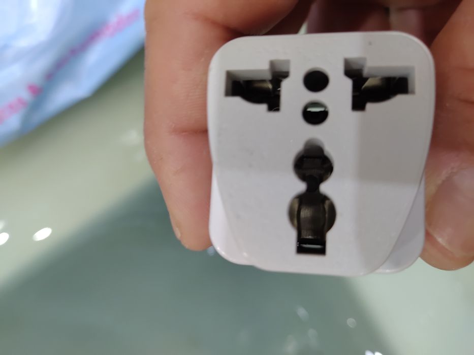 Adaptador corrente novo