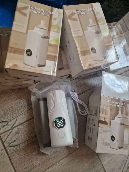Підігрівач портативний для дитячих пляшечок з  акумулятором .