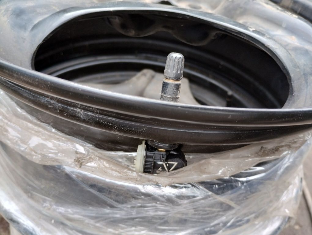 4x100 15 cali felgi stalowe strukturalne z czujnikami Opel Adam corsa