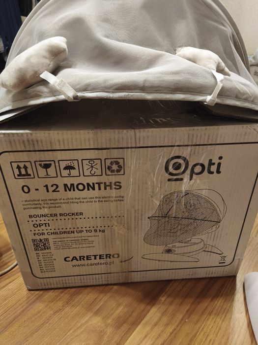 Шезлонг-гойдалка для малюка Caretero Opti
