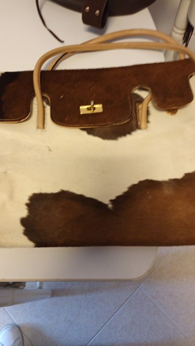 Mala em pele de vaca