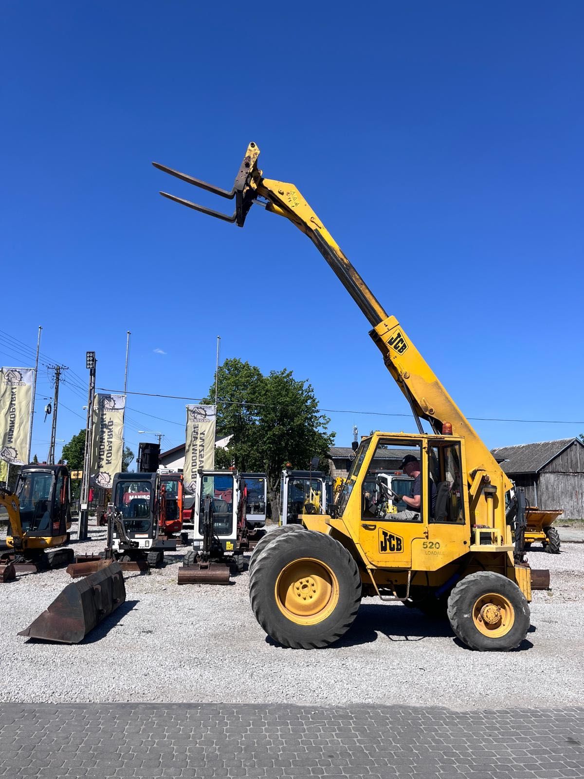 Ładowarka Teleskopowa JCB 520-4  WIDŁY ŁYŻKA 5 metrów napęd 4x4 okazja