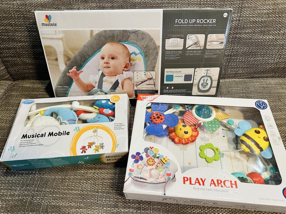 Дитяча гойдалка, бряскальця, мобайл.