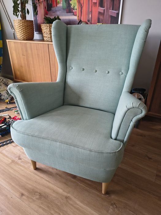 Fotel Ikea Strandmon z podnóżkiem. Bdb. Miętowo błekitny.