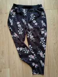 Czarne spodnie w kwiatki Yours rozmiar 50