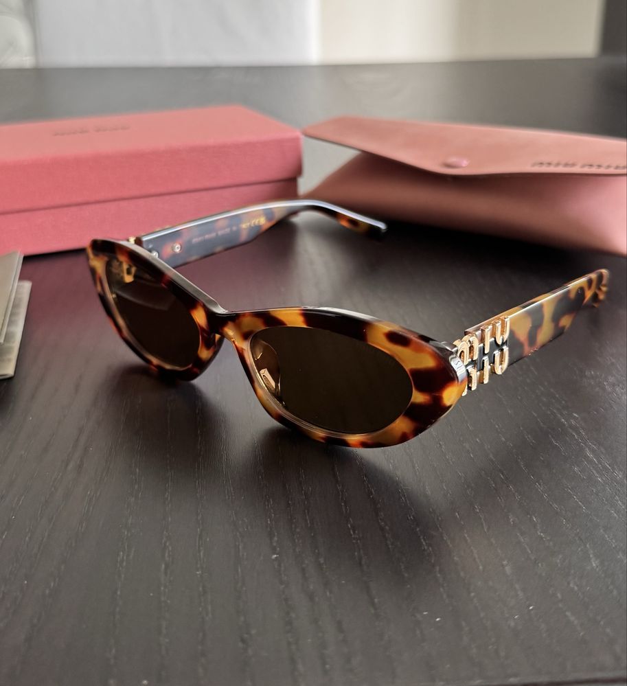 Óculos de sol MIU MIU
