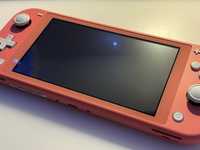 Nintendo Switch Lite koralowy + case