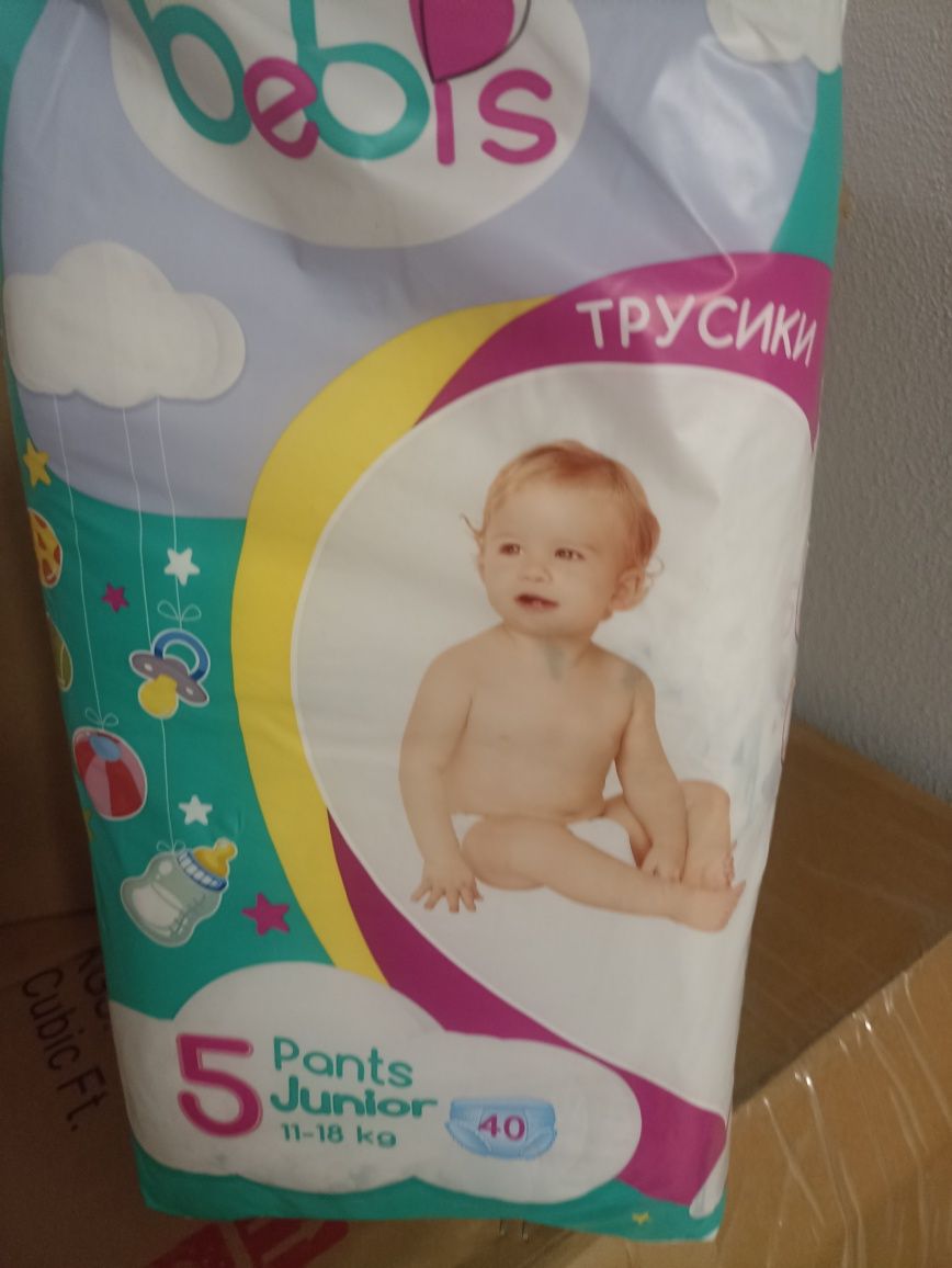 Продам трусики и подгузники Бебис