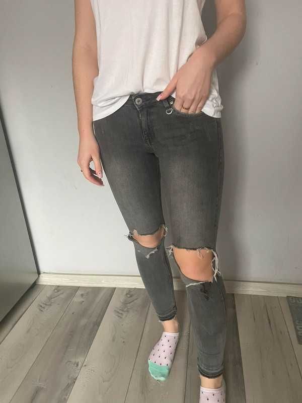 Spodnie z niskim stanem z dziurami H&M dżinsowe