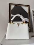 Elegancka torebka Louis Vuitton