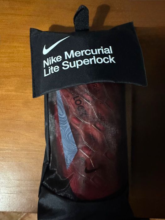 Caneleiras Nike Mercurial Lite Superlock
