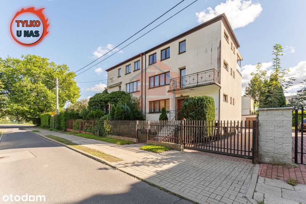 Przestronny dom po remoncie z 3 garażami!