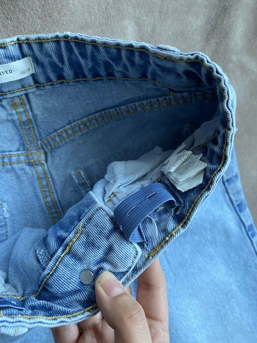 Spodnie dzwony szerokie szarpane nogawki Reserved 152cm jeansy