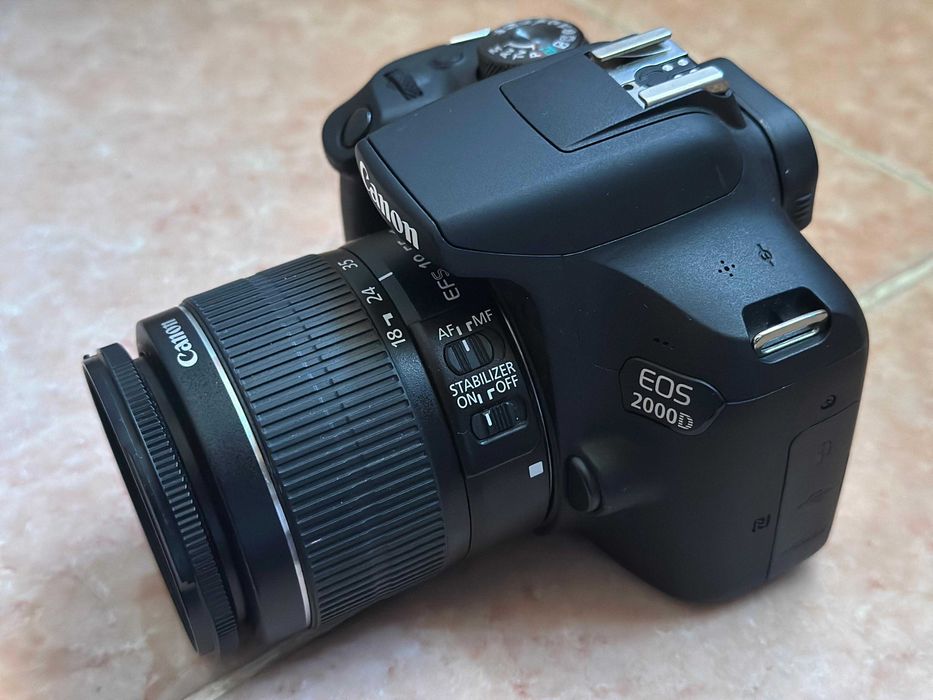 Canon EOS 2000D DSLR + Lente 18-55mm + Bateria Extra + Mala Transporte