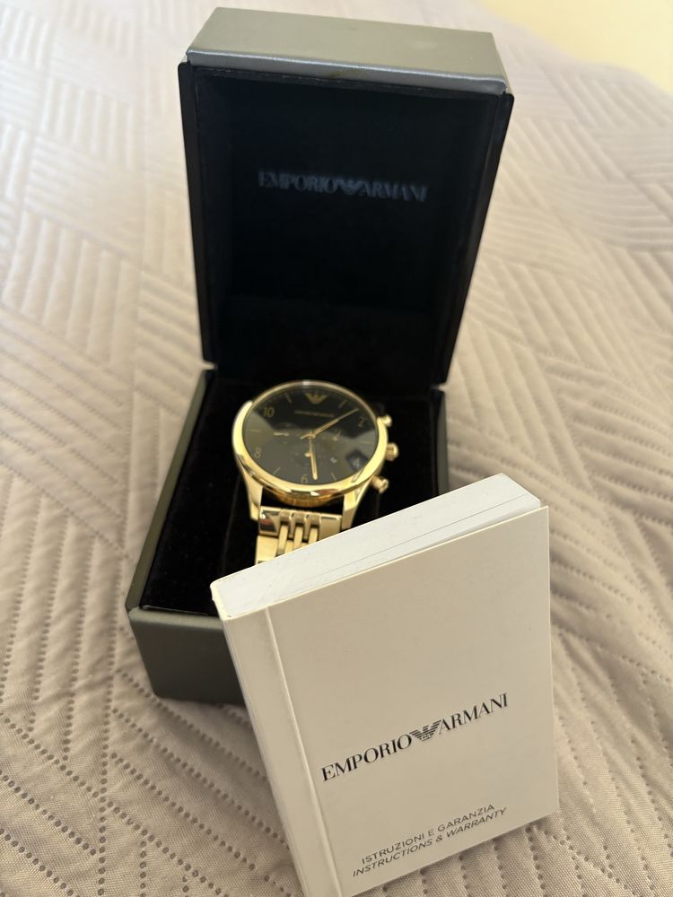 Zegarek zloty Emporio Armani z fabryczna folia od wewnątrz