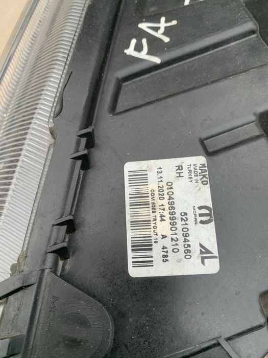 Права фара Fiat Doblo оригінал чорна фіат добло