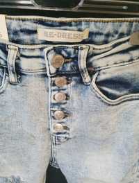 Spodnie dżinsy z przetarciami