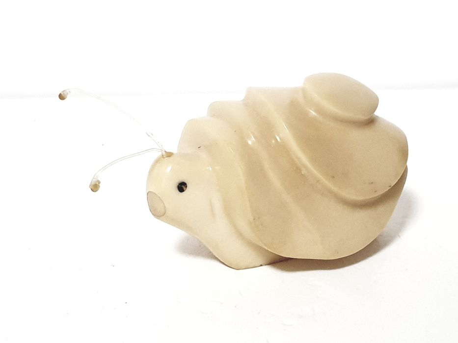Invulgar antigo caracol em celuloíde?