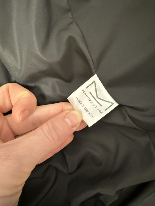 Продам пуховик чорний довгий