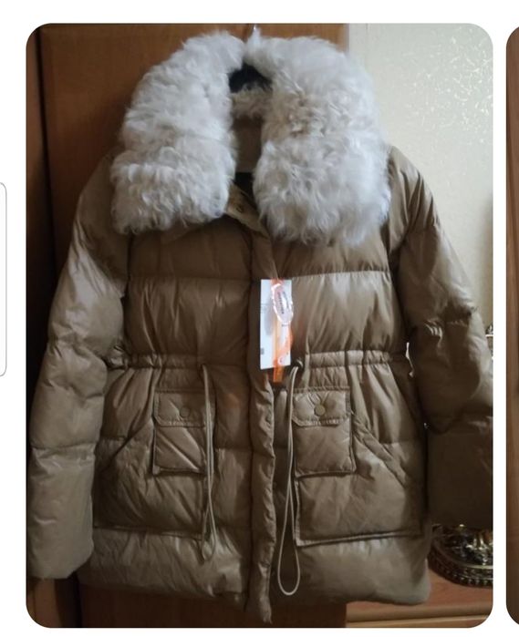 Пуховик жіночий,  новий,  натуральний  комір  з лами.